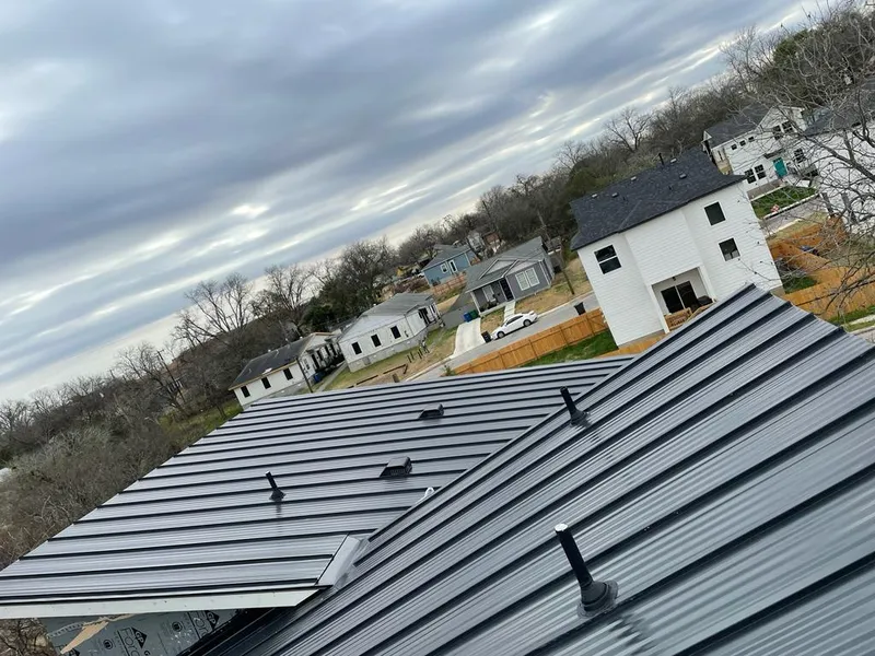 Standing seam metal roof panels with vents for Skylight Repair in Festus